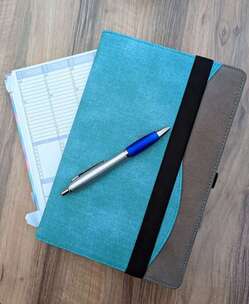 Developmental Edits tools: a planner, my tablet and a pen